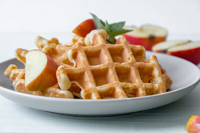 Waffles with apples on a plate