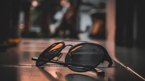 Close-up of sunglasses on table