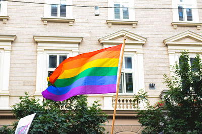 Low angle view of flag against building