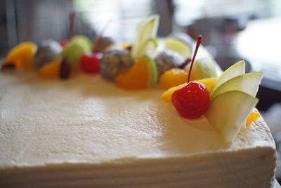 Close-up of fruits in plate on table