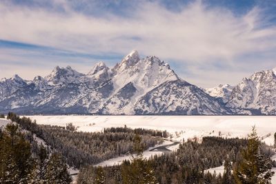 Scenic view of snow covered mountain and snowy landscape