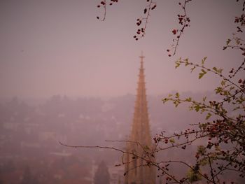 View of city against sky during sunset