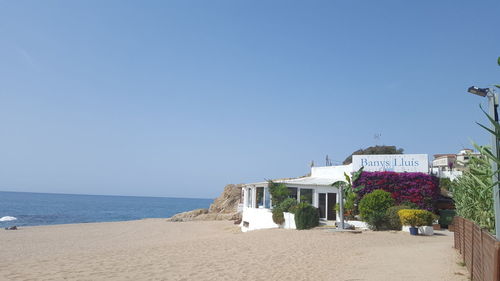 View of sea against clear blue sky