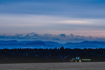 Scenic view of mountains against sky during winter