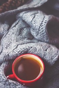 High angle view of black tea in cup