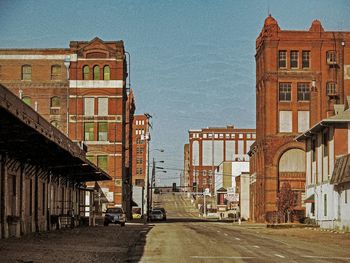 Road leading towards buildings