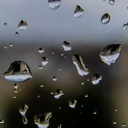 Close-up of water drops on glass