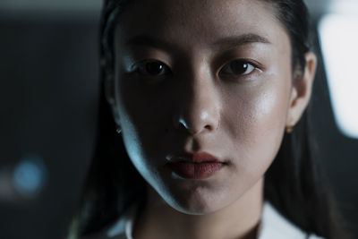 Close-up portrait of young woman