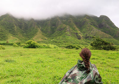 Rear view of woman looking at mountain