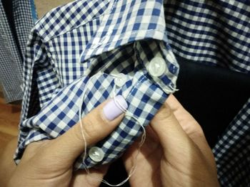 Midsection of man wearing mask