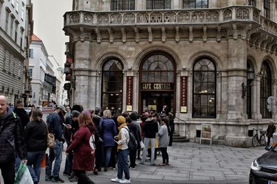 Group of people in front of building