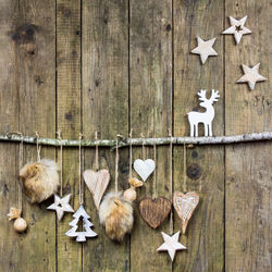 Christmas decorations on wooden wall