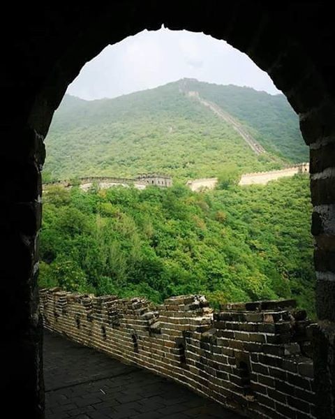 built structure, architecture, mountain, arch, indoors, history, the past, stone wall, sky, tranquility, ancient, old ruin, tree, landscape, day, travel destinations, archway, nature, building exterior, scenics