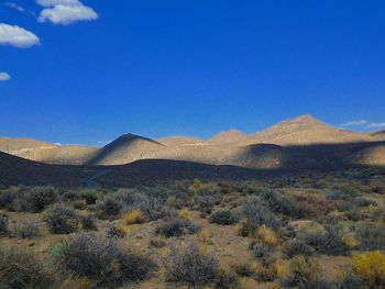 Scenic view of mountains against clear sky
