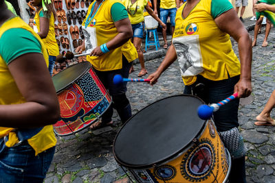 Dida band members play percussion instruments at pelourinho in salvador, 
