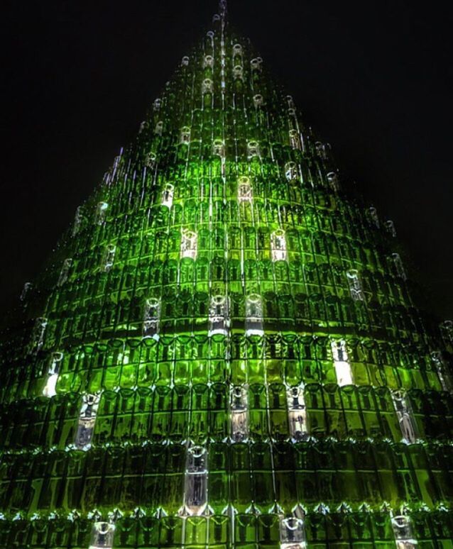 LOW ANGLE VIEW OF ILLUMINATED BUILDING AGAINST SKY