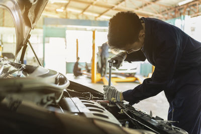 Side view of man working