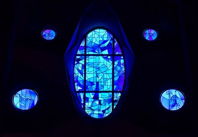 Low angle view of illuminated window