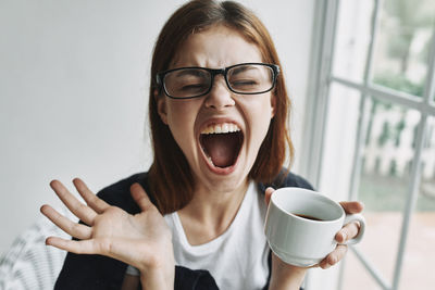 Portrait of woman with coffee