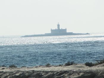 Scenic view of sea against clear sky