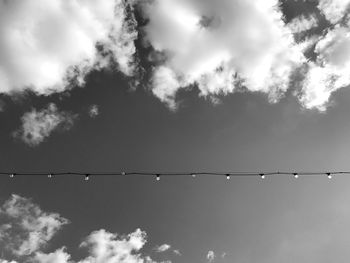 Low angle view of cables against sky