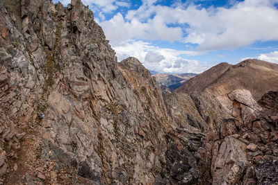 Scenic view of rocky mountains against sky