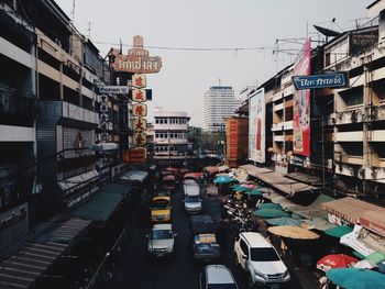 City street amidst buildings against sky
