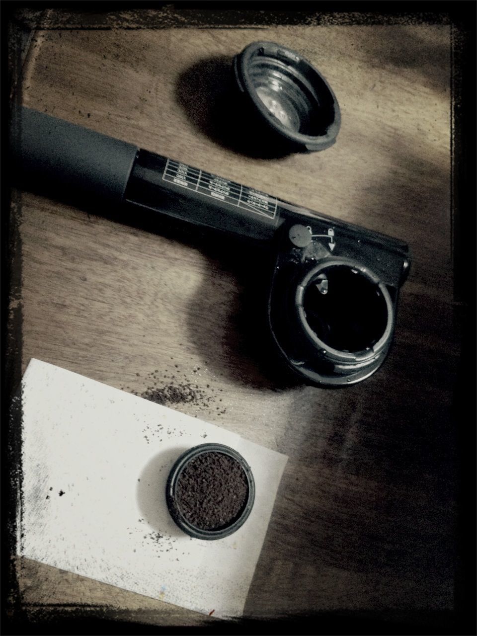 indoors, still life, table, close-up, technology, high angle view, drink, metal, no people, old-fashioned, retro styled, coffee cup, communication, single object, wood - material, equipment, connection, antique, auto post production filter, old