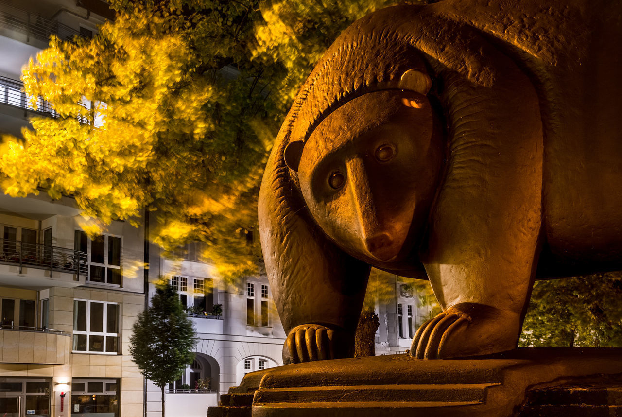 STATUE OF BUILDING AND TREES