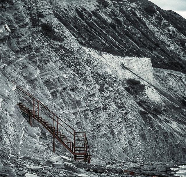 mountain, damaged, nature, landscape, built structure, transportation, tranquility, rock - object, day, rocky mountains, old, high angle view, non-urban scene, abandoned, architecture, tranquil scene, deterioration, rock formation, outdoors, obsolete