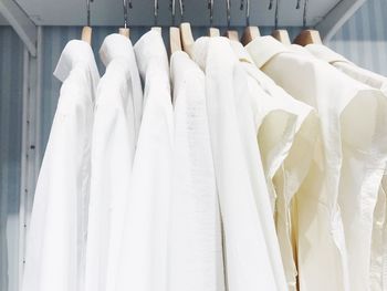 Close-up of clothes hanging on rack