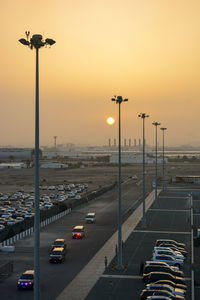 High angle view of street against sky during sunset