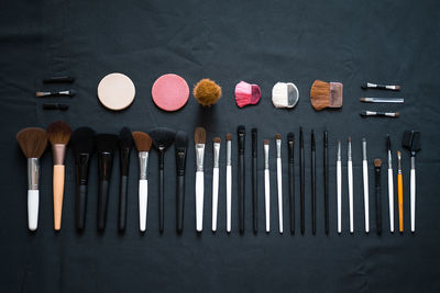 Directly above shot of beauty products arranged on table