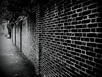 Night view of illuminated brick wall