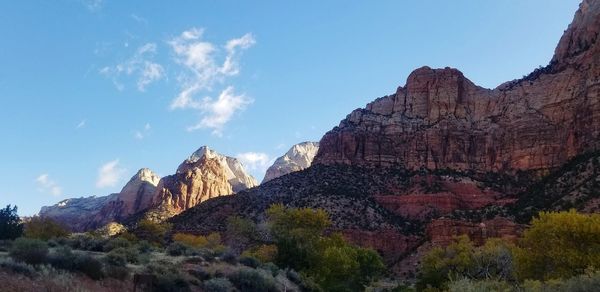 Low angle view of rock formations against sky