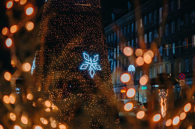 Illuminated christmas tree at night