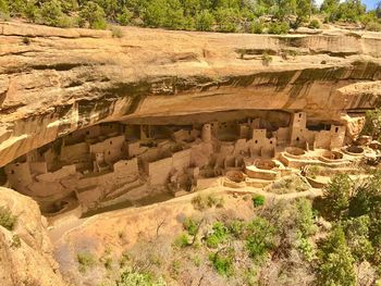High angle view of shadow on brick wall