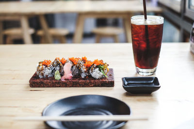 Close-up of sushi served on table