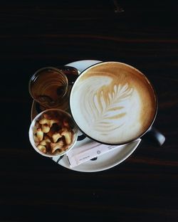 Close-up of cappuccino on table