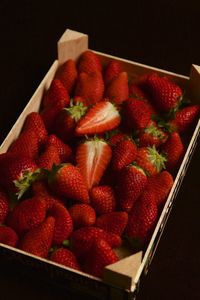 High angle view of strawberries in box