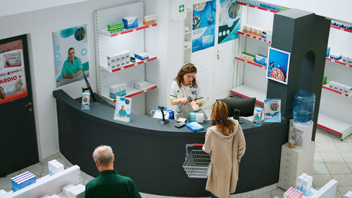 High angle view of people working at home