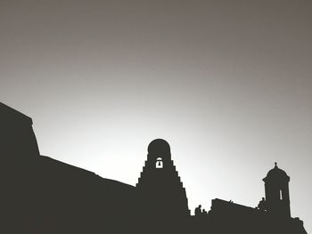 Low angle view of silhouette castillo san felipe de barajas against clear sky