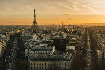 High angle view of city buildings during sunset