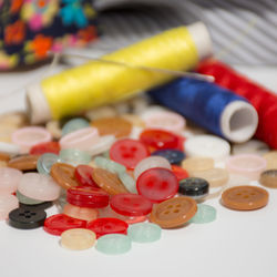 Close-up of buttons on table