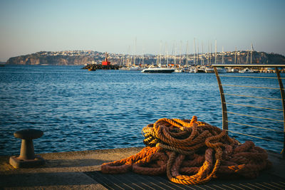 Boats moored at harbor