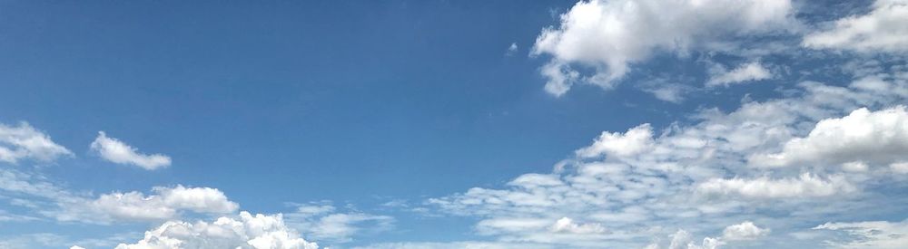 Low angle view of clouds in blue sky