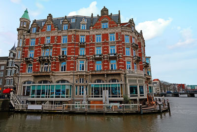 View of building against cloudy sky