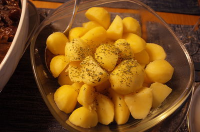 High angle view of yellow eggs in bowl