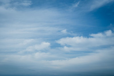 Scenic view of landscape against blue sky