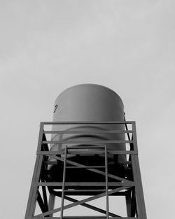 Low angle view of water tower against sky